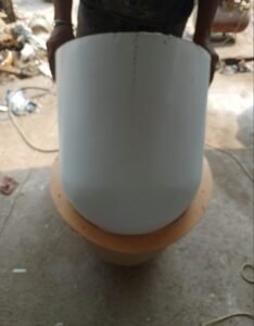 White cylindrical fiberglass container with a broad base
