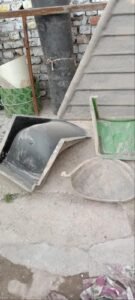 Fiberglass chair mould and production sample in a workshop
