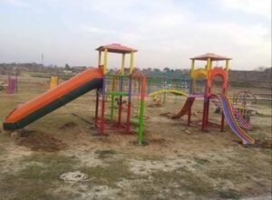 Outdoor children’s playground with multiple slides and play towers
