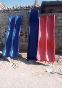 Blue and red fiberglass playground slides shown as separate products