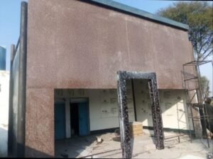 Fiberglass room exterior with brown textured wall panels