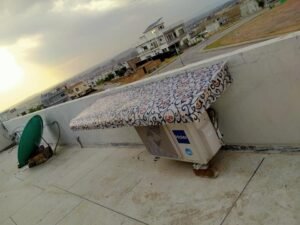MKG Group Fiberglass Sheet installed as a weather cover on a rooftop AC unit