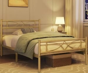 Sample design: gold-finish metal pipe bed with a decorative headboard and footboard